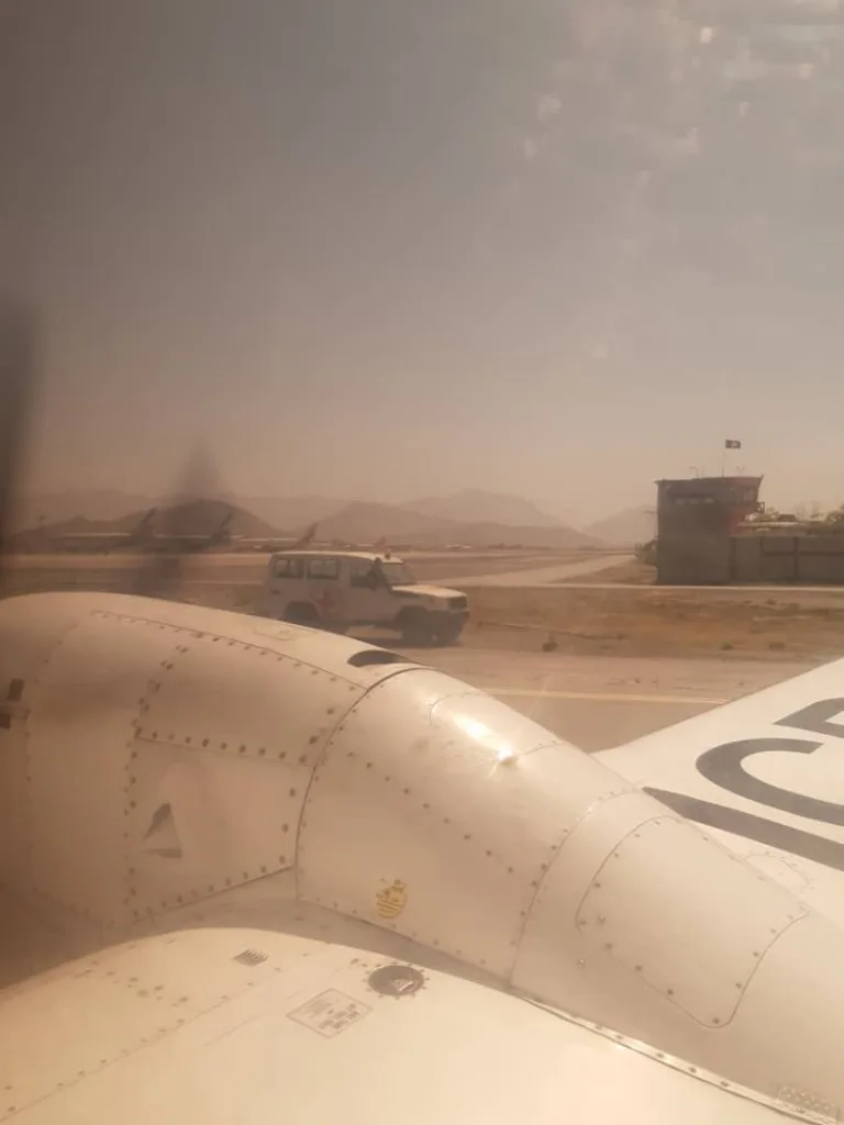 Humanitarian mission airstrip travel from an airplane window